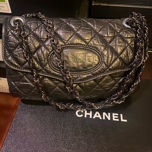 Chanel flap bag in distressed black leather
